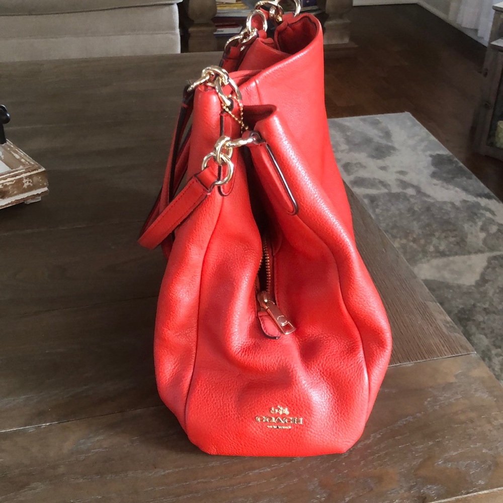Nearly Brand New Coral Coach purse.